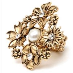 Blackened Flower Statement Ring Stretchy Band This Cocktail Blackened Flower Ring Is Made With Yellow Gold And Features Synthetic Pearl And Diamonds The Flowers Head Of The Ring Measures About 4cm The Stretch Band Has About 1cm In Width. Fashionable And Trendy Oversize Cocktail Ring Elasticized. Amrita Singh, Stretch Ring, Stretch Band, Stretch Bands, Casual Chic Style, Flower Ring, Cocktail Ring, Jewelry Bags, Womens Jewelry Rings