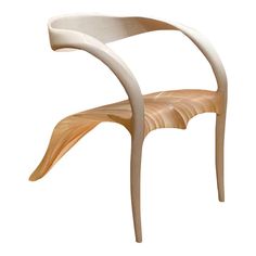 a wooden chair that is shaped like a bird's wing, on a white background