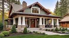 a house that is surrounded by trees and grass