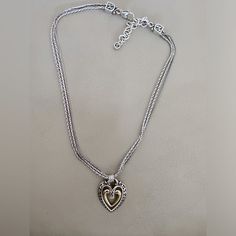 Vintage 925 Pandora Necklace With Triple Chain And Center Gold Plated Swinging Heart. Elegant Heart Pendant Jewelry With Sterling Silver Clasp, Elegant Silver Heart Necklace With Heart Beads, Elegant Open Heart Jewelry With Sterling Silver Clasp, Classic Heart Pendant Jewelry With Sterling Silver Clasp, Elegant Heart Necklace With Silver Chain, Elegant Sterling Silver Jewelry With Heart Beads, Elegant Silver Heart Beads Necklace, Elegant Heart Necklace With Silver Chain For Valentine's Day, Sterling Silver Heart Charm Necklace For Formal Occasions