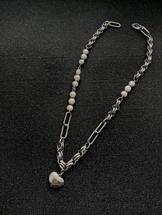 The necklaces are my original idea. I create them with a passion for craftsmanship and I try to ensure that every detail is refined. Necklaces are made mainly of stainless steel and made to order. The necklace in the current offer is made of stainless steel with pearls. I currently have 2 pieces in stock. Adjustable Silver Vintage Pearl Necklace, Vintage Metal Pearl Chain Necklace, Grunge Jewelry Necklaces Pearl, Gothic Stainless Steel Necklace With Adjustable Chain, Vintage Pewter Necklaces With Soldered Details, Unisex Jewelry, Choker Necklace, Beauty Book, Stainless Steel