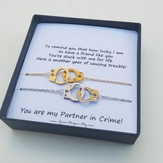 "Partners in Crime, Gold Hand Cuff, Friendship Bracelet, Linked Bracelet These are simple These are fun These are meaningful.... Yet very classy! Beautifully presented in a gift box with a card for your special friend. ★Details; ~You will receive two hand cuff bracelets or necklaces in one box. ~The hand cuffs are gold plated or silver plated stainless steel and 1 inch long in size. ~The chain is stainless steel. ~Bracelet measures 6 inches long (length can be adjusted upon request) with 1.5 inc Stainless Steel Bangle Bracelet For Gift, Stainless Steel Bangle Bracelet As Gift, Elegant Stainless Steel Bracelet For Best Friend, Meaningful Gold Cuff Bracelet As Gift, Minimalist Stainless Steel Cuff Bracelet As Gift, Meaningful Bangle Cuff Bracelet Gift, Meaningful Cuff Bracelet Gift, Elegant Cuff Bracelet For Valentine's Day Gift, Elegant Valentine's Day Cuff Bracelet Gift