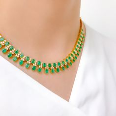 Unleash your inner diva with this 18k Yellow Gold Emerald and Diamond Necklace Set, weighing 41.8g. Encrusted with 2.95 ct diamonds of F-G color and VS quality, this set radiates luxury. With an adjustable link, matching earrings, and a screw-back post, it's perfect for any occasion. The hook lock adds to its elegance. This high fashion set is a must-have in your collection. PRODUCT DETAILS Gold Purity(karat): 18k Item Weight(grams): 41.8 Item Finish: Yellow Gold Stone: Diamond Diamond Weight(ca Emerald And Diamond Necklace, 18k Gold Necklace, Diamond Necklace Set, Yellow Gold Necklace, Gold Necklace Set, Luxurious Design, Gold Stone, Quality Diamonds, White Gold Diamonds