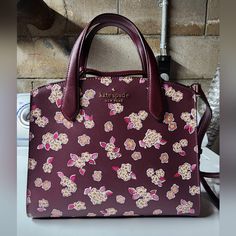 Brand New Kate Spade Purse. Maroon With Flowers. 10.5"L X 3.5"W X 8.5"H With Handles And Long 21" Strap Elegant Kate Spade Bags With Floral Print, Elegant Kate Spade Floral Print Bags, Elegant Red Bags With Floral Print, Elegant Red Floral Print Bags, Teal Purse, Orange Purse, Snakeskin Purse, Kate Spade Shoulder Bag, Bags Kate Spade