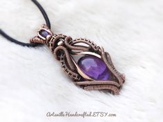 "Wire Wrapped Amethyst Pendant, Empath Protection Amethyst Necklace, Elven Jewelry, Protection Amulet Necklace, Healing Amethyst Gift for Her Unique Handmade Artisan Jewelry !! Original Designs by ArtsvilleHandcrafted If you love unique designs and Amethyst then...this beauty is perfect for you!! This piece has a gorgeous Amethyst, garnet and is created with Pure Copper Wires. IMPORTANT Select your choice of length for the necklace. All Jewelry is Gift Wrapped!! And dispatched within 1-2 working Purple Amethyst Amulet Jewelry, Empath Protection, Wire Wrapped Stone Jewelry, Elven Jewelry, Amethyst Healing, Protection Amulet, Amulet Necklace, Wire Wrapping Stones, Wire Weaving