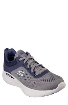 Mesh paneling allows your foot to breathe in a sporty sneaker from Skechers that's built on a supportive sole. Textile upper/synthetic lining and sole Imported Navy Running Shoes With Round Toe For Sports, Synthetic Sneakers With Air Max Cushioning For Walking, Synthetic Air Max Cushioned Sneakers For Walking, Navy Low-top Breathable Running Shoes, Navy Breathable Sneakers For Light Sports, Breathable Navy Sneakers For Light Sports, Navy Breathable Sneakers For Jogging, Navy Low-top Running Shoes With Boost Midsole, Navy Breathable Sneakers For Sports