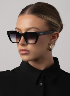 SQUARED CATEYE SUNGLASSES WITH OVERSIZED FIT IN BLACK PRODUCT DETAILS Frame Shape: Squared Cateye Frame Color: Black with Metal Lining Lens Color: Gradient Smoke, Lens Category 3 100% UV Protection Comes with a Protective Vegan Pouch SIZE MM INCHES FRAME WIDTH 143MM 5.6" FRAME HEIGHT 47.7MM 1.8" NOSE GAP 14MM 0.55" Sleek Black Square Frame Cat Eye Sunglasses, Black Rectangular Cat Eye Sunglasses With Gradient Lenses, Black Cat Eye Sunglasses With Gradient Square Frame, Black Square Frame Cat Eye Sunglasses With Gradient Lenses, Black Square Sunglasses With Gradient Lenses, Black Square Sunglasses For Parties, Black Square Sunglasses For Party, Chic Black Square Sunglasses, Chic Black Cat Eye Sunglasses With Square Frame