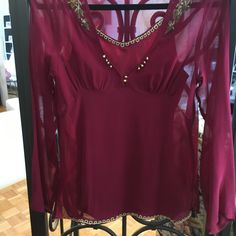 Silk Over The Head Blouse. Two Pieces. Rich Cranberry Color. Size S Camisole With Braided Trim At Top. Front Length 18 1/2”. Back Length 15 1/2”. Under Arm To Under Arm-17 1/2” Long Sleeve V-Neck Top With Braided Hem And Beading On Top Front. Plain Back. Center Front Length-15 1/2”. Center Back-25”. Underarm To Underarm -18”. Sleeve Length-23” Fitted Burgundy Blouse For Party, Chic Red Tops For Festival, Elegant V-neck Tops For Festivals, Elegant Fall Festival Tops, Shirt With Long Sleeve Under, Whimsigoth Top, Thrift Inspo, 2024 Style, Cranberry Color