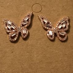 Brand New, Never Worn 14k Rose Gold-Plated Baguette Butterfly Stud Earrings W/Swarovski Crystals Beautiful Earrings That Glisten In The Sun & When The Light Catches Them. 14k Rose Gold Plated Over Sterling Silver Swarovski Crystals And Rhinestone Baguettes Set In The Butterfly Shape Includes Rose Gold Stud Backs That Caught On The Stem So I Included Silicone Backs Too. Stem Is Delicate So Don’t Pull Too Hard Or It Could Break. No Lowball Offers! But I Reasonable Ones! Rose Gold Cubic Zirconia Earrings With Rhinestones, Rose Gold Earrings With Rhinestones And Cubic Zirconia, Rose Gold Rhinestone Cubic Zirconia Earrings, Pink Rhinestone Earrings In Cubic Zirconia, Rose Gold Earrings With Rhinestones For Gifts, Rose Gold Rhinestone Earrings For Gift, Initial Earrings Studs, Ruby Earrings Studs, Crystals Beautiful