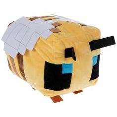 a stuffed animal that has been made to look like a minecraft block with paper on it