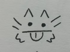 a drawing of a cat's face with its mouth open