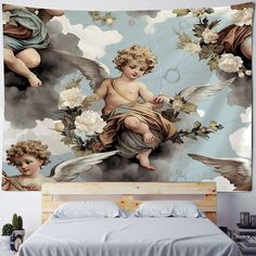 a wall hanging with an angel and cherubs on it in a bedroom next to a bed