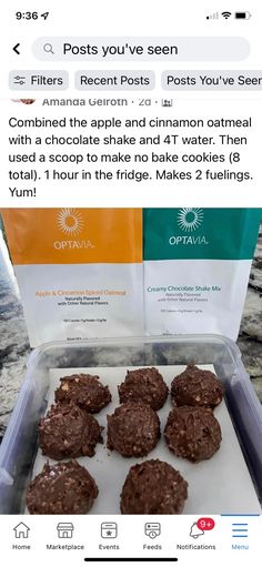 an open plastic container filled with cookies on top of a counter