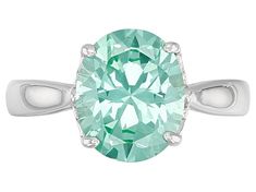 3.42ct oval lab created green spinel, rhodium over sterling silver solitaire ring. Measures approximately .40"L x .42"W. Not sizeable. Finished under gallery. Green Oval Diamond Ring With Diamond Cut, Green Platinum Rings With Accent Stones, Oval Platinum Gemstone With Center Stone, Green Platinum Ring With Round Cut, Green Oval Emerald Ring With Diamond Cut, Oval Green Emerald Ring With Diamond Cut, Oval May Birthstone Diamond Ring With Diamond Cut, Oval Diamond Cut Ring For May Birthstone, Oval Emerald Ring With Diamond Cut In Green