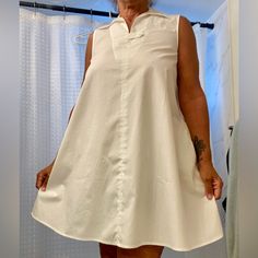 So Comfortable And Easily Dressed Up Or Down! Best Of All? Pockets. This Dress Is A Small And My Dress Size Is A 10 And Fits Me Perfectly. I Should Know - I Own It In Black! It Is A Minidress And Falls About 2” Above The Knee. I’m 5’-4 1/2” And It’s The Perfect Length. 100% Cotton - Poplin Reasonable Offers Considered~ White Shift Shirt Dress For Daywear, Summer A-line Shirt Dress For Daywear, Cotton A-line Mini Dress For Daywear, Cotton Collared Shift Dress, A-line Shirt Dress For Summer Daywear, Shift A-line Mini Dress For Daywear, White Shift Shirt Dress For Day Out, Sleeveless Shift Mini Dress For Daywear, Chic Cotton Shirt Dress For Daytime