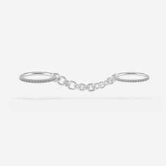 Integrating elements of our classic full round bands and contemporary chains, the Indus Silver Ring displays an all-new, unique silhouette entirely constructed in .925 sterling silver with optional gray diamonds. Meant to be worn across multiple fingers, this style features two anchoring bands in staggered sizes that amplify the elegant drapery of our multi-gauged Helio Chain. The Indus Silver Ring is available in select sizing combinations and is perfect for integrating with your favorite Spine Elegant Draperies, Shimmer Shine, Ring Displays, Grey Diamond, Ring Sizer, New Jewelry, Sterling Silver Bands, Silver Band, Silver Ring