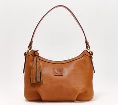 Crafted of rich Florentine leather, this pouchette bag boasts a classic design that will never go out of style. Carry this timeless treasure for seasons to come. From Dooney & Bourke. Elegant Cognac Bags With Brass Hardware, Elegant Shoulder Bag With Brass Hardware, Elegant Cognac Pouch Shoulder Bag, Elegant Smooth Grain Pouch Shoulder Bag, Dooney Bourke Handbags, Dooney And Bourke, Dooney & Bourke Bags, Dooney & Bourke, Timeless Treasures