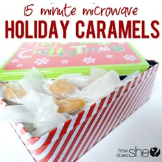 a box filled with holiday caramels on top of a table