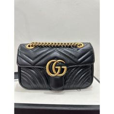 New with tags: A brand-new, unused, and unworn item (including handmade items) in the original packaging (such as the original box or bag) and/or with the original tags attached. Gucci GG Marmont Shoulderbag Matelasse Gold Black Leather Handbag Bag Purse New The small GG Marmont camera bag has a softly structured shape and a flap closure with Double G hardware. The sliding chain strap can be worn multiple ways, changing between a shoulder and a top handle bag. Made in matelassé chevron leather with a heart on the back. Features Points: Antique gold-toned hardwareInterior zipper pocketFlap with spring closureThe Gucci card case wallet will fit inside this productThe model is 178cmMicrofibre lining with a suede-like finish Dimension: 10"W x 6"H x 3"DWeight: 1.42lbs Materials and Care: Gucci Leather Shoulder Bag For Daily Use With Original Box, Gucci Rectangular Bag With Gold-tone Hardware, Leather Travel Satchel With Original Box, Leather Bags With Original Box For Gifts, Chic Gucci Rectangular Bag, Black Shoulder Satchel, High-end Pouch Shoulder Bag With Branded Hardware, High-end Travel Flap Bag With Original Box, Gucci Rectangular Satchel With Branded Hardware