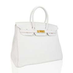 Hermes Birkin 35 bag featured in White.Lush with Gold hardware.A beautiful year round neutral color., white is the most rare of all Hermes colours produced in leather.This Hermes Birkin is created with plush Clemence leather.Comes with lock, keys, clochette, and sleepers.Very like new body, corners, handles and interior.Hardware has very minor markings.Mightychic has excelled in customer service for 21 years and provides a discreet online shopping experience for beautiful Hermes selections. fina Hermes Colours, Interior Hardware, Hermes Birkin 35, Neutral Color, Hermes Birkin, White Bag, High Quality Leather, Bag Sale, Gold Hardware