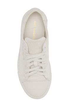 A smooth leather toe cap provides a subtle textural contrast to the luxe suede of this sophisticated and versatile monochrome sneaker. Lace-up style Leather upper and lining/rubber sole Made in Portugal Luxury White Sneakers With Rubber Heel Cap, Classic White Suede Sneakers, Classic Cream Suede Sneakers, Classic White Everyday Sneakers, Classic Cream Sneakers, Classic Sneakers With Suede Lining And Round Toe, Classic Suede Sneakers With Rubber Heel Cap, White Suede Sneakers With Rubber Heel Cap, White Luxury Suede Sneakers