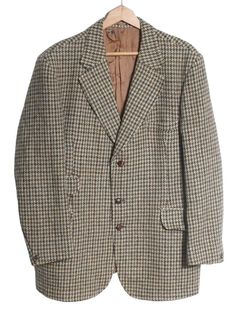 Vintage Dunn & Co dogtooth Harris Tweed jacket. This is an original from the 1960's. Notched lapels, four front pockets and twin vent reverse. Fully inside lined.  Condition: Excellent vintage condition. Chest: 42in Length: 33in Inside sleeve: 17in Across the shoulders: 18in More vintage clothing on our website www.brickvintage.com Vintage Houndstooth Outerwear With Notch Lapel, Retro Tweed Outerwear With Notch Lapel, Vintage Fitted Houndstooth Blazer, Fitted Vintage Outerwear With Houndstooth Pattern, Fitted Vintage Houndstooth Blazer, Retro Tweed Outerwear For Business, Vintage Houndstooth Notch Lapel Blazer, Vintage Houndstooth Tweed Jacket For Business, Vintage Houndstooth Tweed Jacket For Formal Occasions