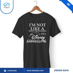 I'm Not Like A Regular Grandma I'm A Disney Grandma Disneyland Vacation Gildan Man's T-Shirt Alwaysky x Disney 2024. This well-made shirt is the epitome of comfort and elegance. Made from high-quality cotton, this adaptable piece may be worn in any setting. Raise the ante on your appearance with ease!. #grandma #Shirt #Alwaysky Black Pre-shrunk T-shirt For Disney Trips, Graphic Tee For Disney Trips In Black, Black Graphic Tee For Disney Trips, Black T-shirt With Letter Print For Disney Trips, Graphic Tee With Letter Print For Disney Fan Events, Disney Style T-shirt For Disney Fan Events, Black Cotton T-shirt For Disney Trips, Disney Letter Print Cotton T-shirt, Cotton T-shirt With Letter Print For Disney Fans