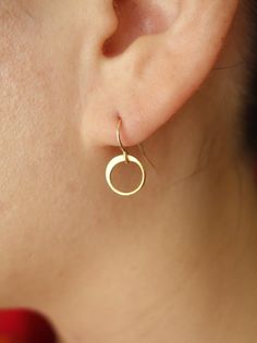 This 24k gold plated over sterling silver circle earrings are very cute and perfect for a night out, and just as perfect for everyday. Perfect. Simple yet rich, these earrings measure 5/8" or 17mm from the top of the gold filled ear wire to the bottom, with the circle measuring 9mm x 9mm or 3/8" x 3/8 ". These single circle earrings are also available in sterling silver, and also in other sizes up to 23mm. Just choose the size and material from the dropdown above. (NOTE: all photos show the 9mm