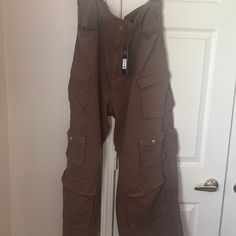 Women Nwt Fashion Nova Brown Cargo Pants Size 22 Brand / Fashion Nova Brand New Perfect For The Spring/Summer Cargo Is Very Popular Pants Thanks For Shipping By My Shop Summer Cargo Jeans With Pockets, Brown Cargo Style Bottoms, Summer Trousers With Multiple Pockets, Summer Straight Pants With Multiple Pockets, Brown Wide Leg Cargo Bottoms, Brown Baggy Cargo Style Bottoms, Baggy Brown Cargo Style Bottoms, Brown Cargo Style Straight Pants, Brown Full Length Cargo Pants