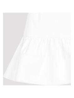 Get ready to twirl in this adorable ruffle mini skirt. Made from 100% cotton, it's lightweight and perfect for any warm-weather occasion. Whether you're out for a casual day with friends or dressing up for a night out, this skirt is a versatile and fun addition to your wardrobe. 100% cotton for lightweight comfort Adorable ruffle detail for a fun and flirty look Versatile and perfect for any warm-weather occasion | Patou Women's Ruffle Mini Skirt in White | Size FR 34 | SK0600074 Day With Friends, Ruffle Mini Skirt, White Skirts, Warm Weather, Mini Skirt, Night Out, Mini Skirts, Dress Up, With Friends