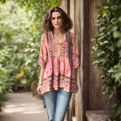 Embrace the free-spirited beauty of our Unique Handmade Flowy Bohemian Peasant Blouse! This stunning top features: - Delicate floral patterns dancing across a soft, flowy fabric - Relaxed, peasant-style silhouette with a comfortable fit - Loose sleeves and a V-neckline for a romantic, bohemian vibe Sizes: XS: Length 27" front 29" back, Bust 28" S: Length 27" front 29" back, Bust 32" M: Length 27" front 29" back, Bust 36" L: Length 27" front 29" back, Bust 40" XL: Length 27" front 29" back, Bust Bohemian Blouse, Flowy Fabric, Loose Sleeves, Bohemian Blouses, Stunning Tops, Tie Shirt, Peasant Style, Peasant Top, Free Spirited