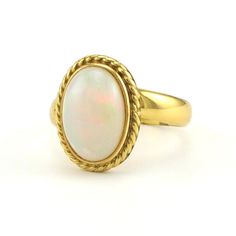 Alchemía Ethiopian Opal Oval Rope Ring Luxury Ethiopian Opal Cabochon Rings, Luxury Handmade Ethiopian Opal Ring, Rope Ring, Rope Rings, Green Fire, Ring Setting, Base Metal, Ethiopian Opal, Ring Sets