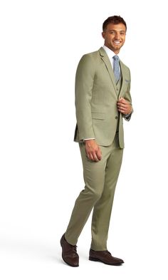 We're loving this new light green sage suit with stretch material.  An obvious hit for spring and summer events but this light green suit can be worn year round during the day.  If you're ready for a new look then change it up with a pale green suit and brown shoes the next time you need to dress up. Tailored Beige Suit For Spring, Tailored Beige Spring Suit, Fitted Khaki Suit For Work, Spring Beige Tailored Suit, Khaki Blazer For Business And Spring Season, Khaki Blazer For Business In Spring, Beige Suits For Business In Spring, Khaki Business Blazer For Spring, Fitted Green Suits For Business