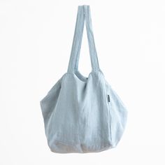 Washed Linen Shopping Bag in Stone blue, Linen Market Bag, Linen Shoulder Bag, Linen Tote Bag, Linen Beach bag A capacious beach, shopping bag made of 100% linen fabric, which is prewashed during production process to make the bag very soft and nice to the touch. Straps long enough to wear the bag on the shoulder. Perfect shopping bag, market bag or beach bag for summer. This bag is made from scarps of fabric, high quality, zero waste production. Produced from 100% prewashed linen. Machine washa Linen Tote Shoulder Bag, Summer Travel Bag Made Of Linen, Summer Style Pouch Hobo Bag For Travel, Summer Travel Hobo Bag In Pouch Shape, Summer Travel Hobo Bag In Pouch Style, Summer Travel Hobo Bag With Removable Pouch, Casual Linen Bags For Summer, Light Blue Travel Bag With Removable Pouch, Eco-friendly Linen Shoulder Bag For Beach