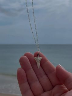 This unique Lemon shark tooth was found in Jupiter Beach, Florida. Silver plated chain necklace is nonadjustable and 18" long with a purple bead included. Nickel-free Arrowhead Necklace Gift, Nickel-free Arrowhead Necklace For Gift, Nickel Free Arrowhead Necklace For Gift, Jupiter Beach Florida, Lemon Shark, Shark Jewelry, Jupiter Beach, Silver Shark, Shark Necklace