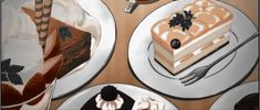 two slices of cake sitting on top of white plates