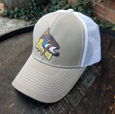 Grab a Brown Trout Kype Creeknuts hat! Brown Trout Kype woven iron-on patch on front. Creeknuts logo woven iron-on patch on left side. Contrast Stitching Trucker Hat, structured 6-panel, velcro closure. Outdoor Snapback Hat With Curved Brim And Embroidered Patch, Gray Outdoor Hat With Logo Patch, Outdoor Snapback Cap With Embroidered Patch, Outdoor Trucker Hat With Embroidered Patch And Curved Bill, Outdoor Baseball Cap With Embroidered Patch, Curved Bill Hat With Custom Logo For Outdoor, Adjustable Trucker Hat With Patches For Outdoor, Outdoor Adjustable Trucker Hat With Patches, Casual Outdoor Hats With Patches