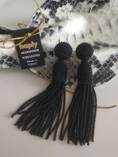 Long beaded tassel earrings are elegant and versatile, excellent addition to the evening dress as well as to every day clothes. My bead tassel earrings collection was inspired by designer Oscar de La Renta and handmade by me. I've been building it successfully since 2017 and it's on my bestseller list. and also I make it with love and use it with love. Elegant Tassel Earrings With Round Dangling Beads, Party Beaded Fringe Earrings Adjustable, Black Beaded Dangle Tassel Earrings As Gift, Dangle Tassel Earrings With Black Beads For Gift, Evening Beaded Earrings With Round Beads, Black Beaded Drop Earrings, Black Tassel Earrings With Dangling Beads As Gift, Gift Tassel Earrings With Black Beads In Dangle Style, Adjustable Elegant Tassel Earrings For Party