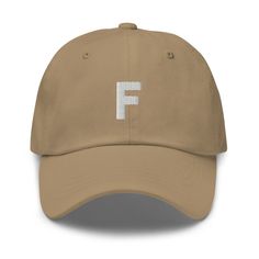 "This initial dad hat makes a perfect gift for your bridal party, bachelorette parties, or is a great 'treat yourself' gift!  * 100% chino cotton twill * Unstructured, 6-panel, low-profile * 6 embroidered eyelets * 3 ⅛\" (7.6 cm) crown * Adjustable strap with antique buckle * Head circumference: 20 ½″-21 ⅝″ (50.8 cm-53.3 cm)" Monogram Alphabet, Dad Cap, Love Hat, Letter F, Camo Colors, Dad Caps, Neck Gaiter, Girl With Hat, Green Camo