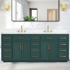 a bathroom vanity with two sinks and a large mirror