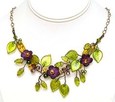 Flower necklace for women in purple adds a pretty pop of color to your attire.  Add a touch of romance for the bride, bridesmaids or the prom queen.  The flowers and vines in my garden were the inspiration for the beautiful piece of wearable art. Details: * Length 17-20 inches (length includes chain extension) * Bronze colored copper wires * Natural brass non-tarnish chain * Handmade hook clasp * Czech Glass Beads and Austrian crystals Please note the shape and style of beads may change dependin Necklaces Purple, Green Necklaces, Purple Jewellery, Botanical Necklace, Vine Necklace, Purple Flower Necklace, Vine Jewelry, Jewelry For Brides, Necklaces Wedding