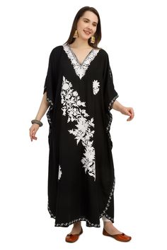 Kashmiri Aari Embroidered Cotton Kaftan.A Stunningly Marvellous Kaftan.This Kaftan Is Made Of Cotton Its Embroidered  With White Colour.Breezy Cotton Bohemian Maxi Dresses Or Caftans Are The Perfect Style Statement For Summer, Spring Days, Beach Holidays.The Embroidery Done On This Is A Traditional Kashmiri Embroidery Known As 'Aari Work''. Product Details - Condition: Brand New - Handmade - Style: Kaftan - Fabric: soft Cotton - Embroidery: Kashmiri Aari Embroidery - Length: 54'' Inch - Chest: 6 Maxi Length Dress With Chikankari Embroidery For Navratri, Navratri Maxi Dress With Chikankari Embroidery, Navratri Chikankari Embroidery Maxi Dress, Summer V-neck Embroidered Dress For Festive Occasions, Bohemian Dresses With Dabka Work, Eid Tunic Dress With Resham Embroidery, Eid Dresses With Intricate Embroidery, Bohemian Embroidered Dress With Dabka Work, Bohemian Embroidered Maxi Dress For Navratri