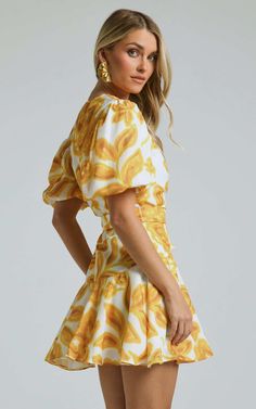 Aleka Mini Dress - V Neck Balloon Sleeve Wrap in Sunshine Floral | Showpo USA Yellow Puff Sleeve Mini Dress For Summer, Yellow Puff Sleeve Mini Dress For Spring, Elegant Yellow Puff Sleeve Dress, Elegant Yellow Mini Dress For Beach, Elegant Yellow Beach Mini Dress, Chic Yellow V-neck Mini Dress, Feminine Yellow V-neck Dress, Elegant Yellow Floral Print Mini Dress, Chic Yellow Mini Dress With Floral Print