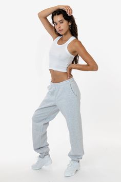 Made from a luxurious 14oz fleece, this sweatpants is incredibly soft and warm, yet still breathable and moisture-wicking. The relaxed fit allows for a full range of motion, making it perfect for lounging around the house, running errands, or hitting the gym. This sweatpant is Piece Dyed. Our piece-dyed sweatpants fabric is dyed before they're cut and sewn, which results in a more uniform color distribution throughout. This means you'll get pants with a cleaner, sharper look, without any color v Fleece Sweatpants For Loungewear, Fleece Pants For Loungewear, Fleece Pants For Loungewear In Athleisure Style, Fleece Pants For Athleisure Loungewear, Fleece Pants For Loungewear And Athleisure, Fleece Sweatpants For Loungewear In Athleisure Style, Fleece Activewear Pants For Loungewear, Fleece Sportswear Bottoms For Loungewear, Sporty Fleece Sweatpants For Loungewear