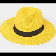 Yellow Classic Fedora Hat With Black Belt. Adjustable String For Sizing Classic Yellow Hat With Short Brim, Classic Yellow Spring Hat, Trendy Yellow Sun Hat With Curved Brim, Yellow Wide Brim Panama Hat For Spring, Yellow Panama Fedora Hat For Spring, Yellow Wide Brim Straw Hat For Beach, Trendy Yellow Sun Hat For Summer, Casual Yellow Hat With Flat Brim, Casual Yellow Panama Hat For Spring