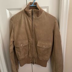 Women’s Belstaff Leather Jacket In Tan. Size It 42, Us 6. Icons Collection Of Amelia Earhart. Used But In Great Condition. Sleeve Length Is 26 Inches, Mid Section Width Is 15 1/2 Inches. Leather Outerwear With Flap Pockets, Beige Leather Biker Jacket For Work, Belstaff Leather Jacket, Belstaff Jackets, Amelia Earhart, Icon Collection, Bomber Jackets, Bomber Jacket, Leather Jacket