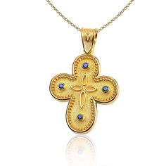 "The beauty of Byzantine style jewelry, completely handcrafted in Greece with the old-fashioned way, is omnipresent. An outstanding solid yellow gold cross with Byzantine design decorated with genuine gemstones, remains a classic and elegant choice for everyone. Bold and traditional, you will not take your eyes off. Neither will your friends! High Quality Handmade Greek jewelry! ✔ Dimensions: Inches: 1 X 0.65 inch ✔ Dimensions: Millimetres: 26 x 16.5 mm ✔ High quality product. ✔ In a gift box ✔ Handmade Gold Jewelry For Baptism, Byzantine Cross Jewelry For Ceremonial Occasions, Byzantine Yellow Gold Cross Necklaces, Byzantine Style Yellow Gold Cross Pendant Jewelry, Byzantine Style Cross Jewelry In Yellow Gold, Byzantine Yellow Gold Cross Jewelry, Byzantine Yellow Gold Cross Necklace, Yellow Gold Byzantine Cross Jewelry, Byzantine Style Yellow Gold Cross Jewelry