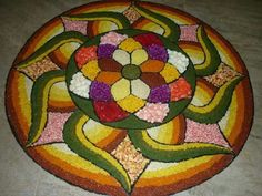 a colorful flower design is on the floor