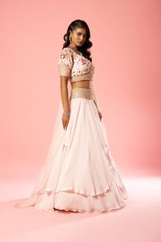 Featuring a baby pink coloured layered lehenga made of organza with intricate hand embroidery in blouse, belt and soft net dupatta. Pink Organza Choli With Traditional Drape, Pink Organza Lehenga With Cutdana, Pink Organza Choli With Cutdana, Pink Cutdana Organza Choli, Pink Organza Choli With Dori Work, Pink Organza Sets With Traditional Drape, Pink Floor-length Organza Lehenga, Pink Organza Choli For Reception, Pink Organza Dress With Cutdana