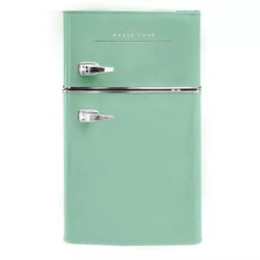 a mint green refrigerator freezer sitting on top of a white counter next to a wall